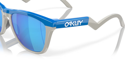 Oakley Frogskins Hybrid Prizm Sapphire Lenses,  Primary Blue/Cool Grey Frame - Cyclop.in