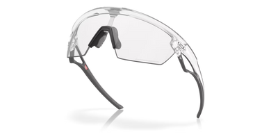 Oakley Sphaera Clear To Black Iridium Photochromic Lenses, Matte Clear Frame - Cyclop.in