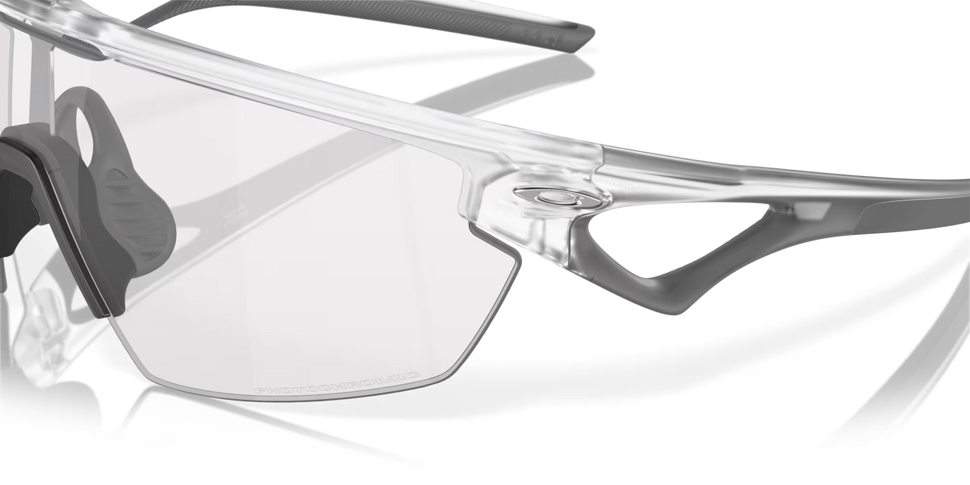 Oakley Sphaera Clear To Black Iridium Photochromic Lenses, Matte Clear Frame - Cyclop.in