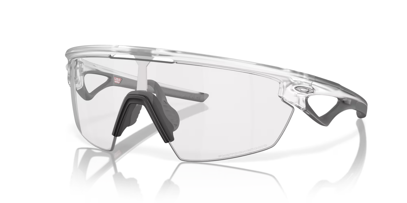 Oakley Sphaera Clear To Black Iridium Photochromic Lenses, Matte Clear Frame - Cyclop.in